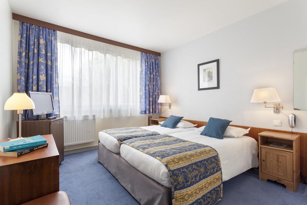 Aerotel Versailles Saint Cyr - L'Etape Du Silence Kamer foto
